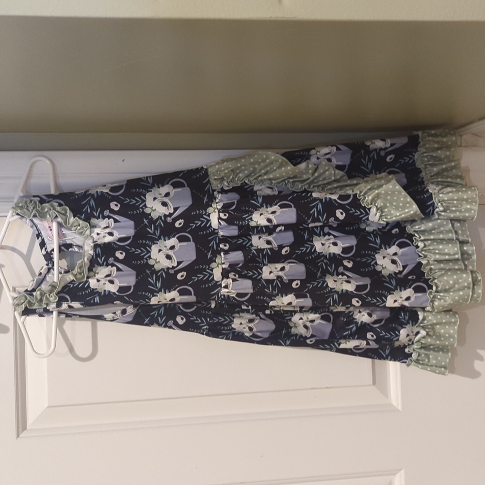 Girls dress with watering can design, size 6